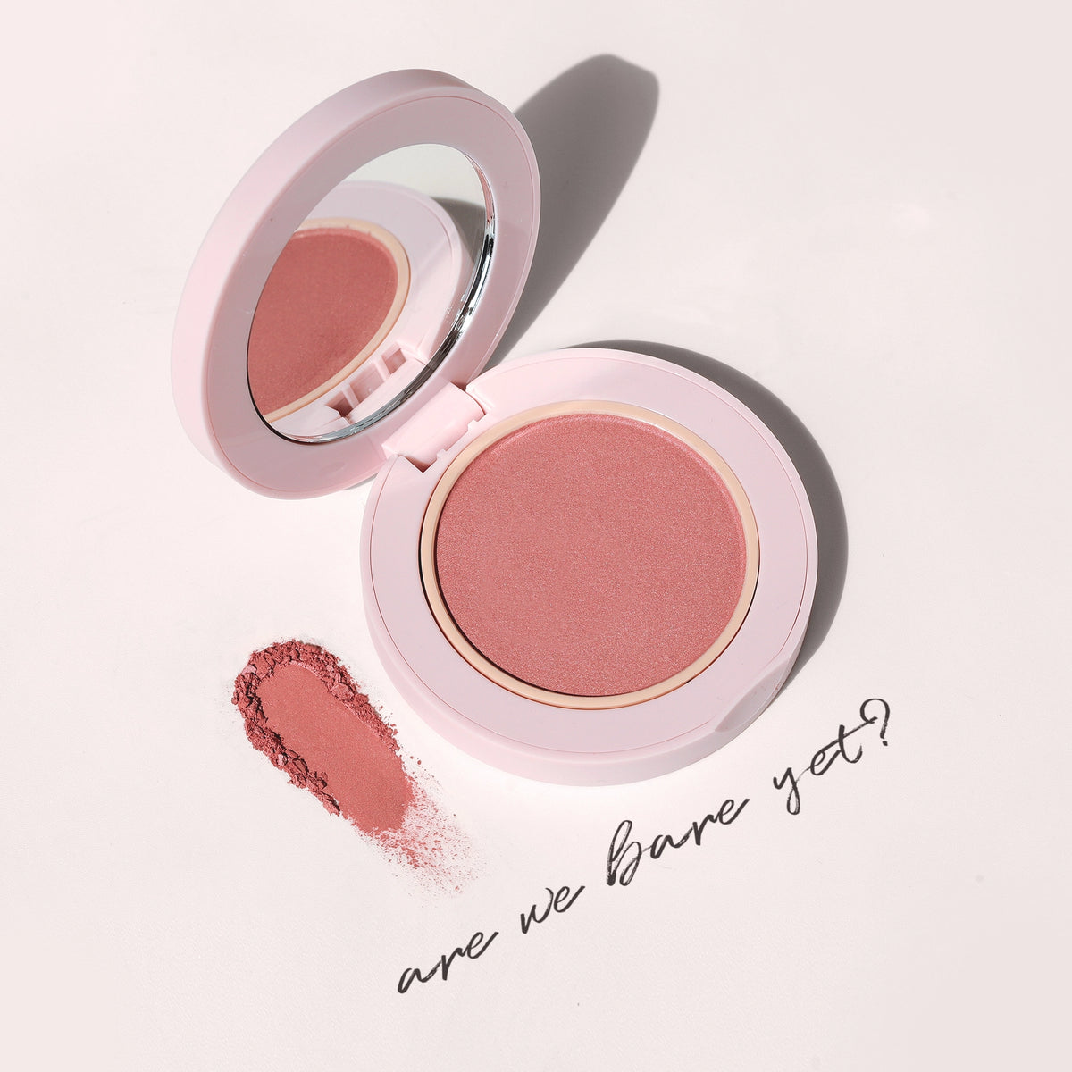Close-up of Blush All Day Hydrating Powder Blush in Are We Bare Yet? texture