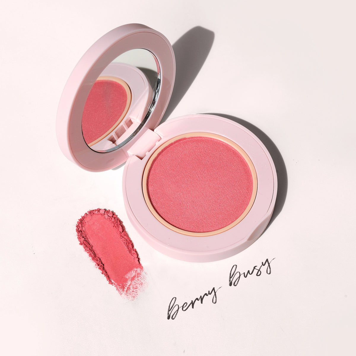 Close-up of Blush All Day Hydrating Powder Blush in Berry Busy texture