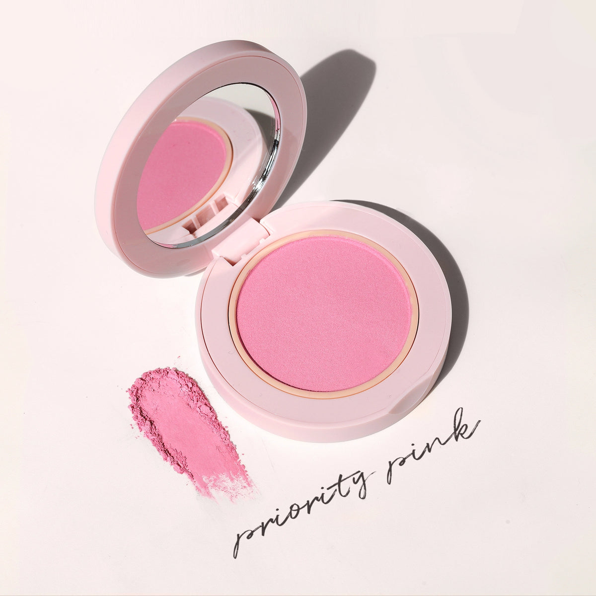 Close-up of Blush All Day Hydrating Powder Blush in Priority Pink texture