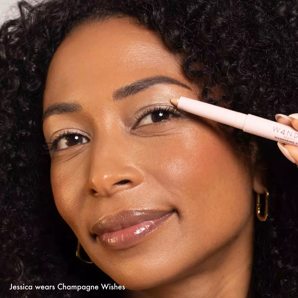 Model wearing Wandering Eyes Shadow Stick in Champagne Wishes
